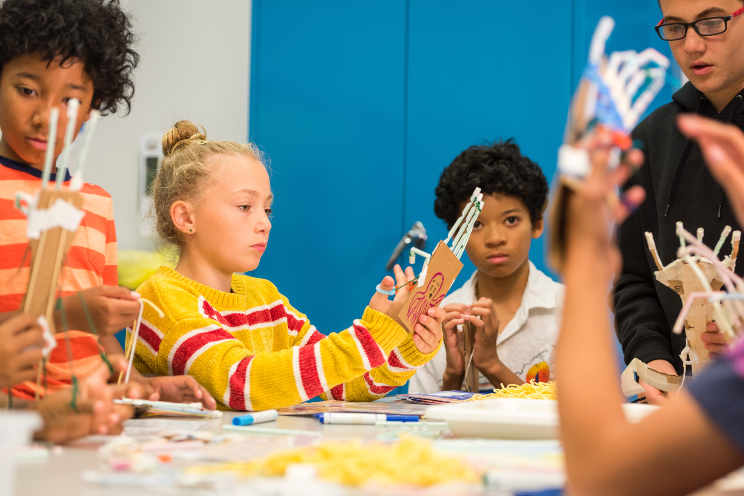 Children working on their science projects.