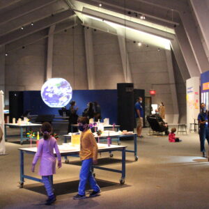 Visitors exploring exhibits at The Lawrence